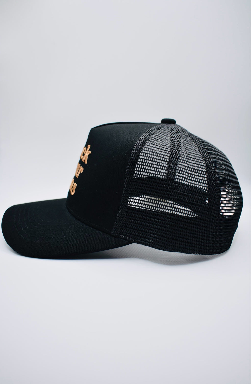 Buck Your Ideas Black / Tan Trucker Cap
