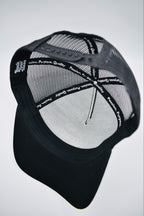 Buck Your Ideas Black / Tan Trucker Cap